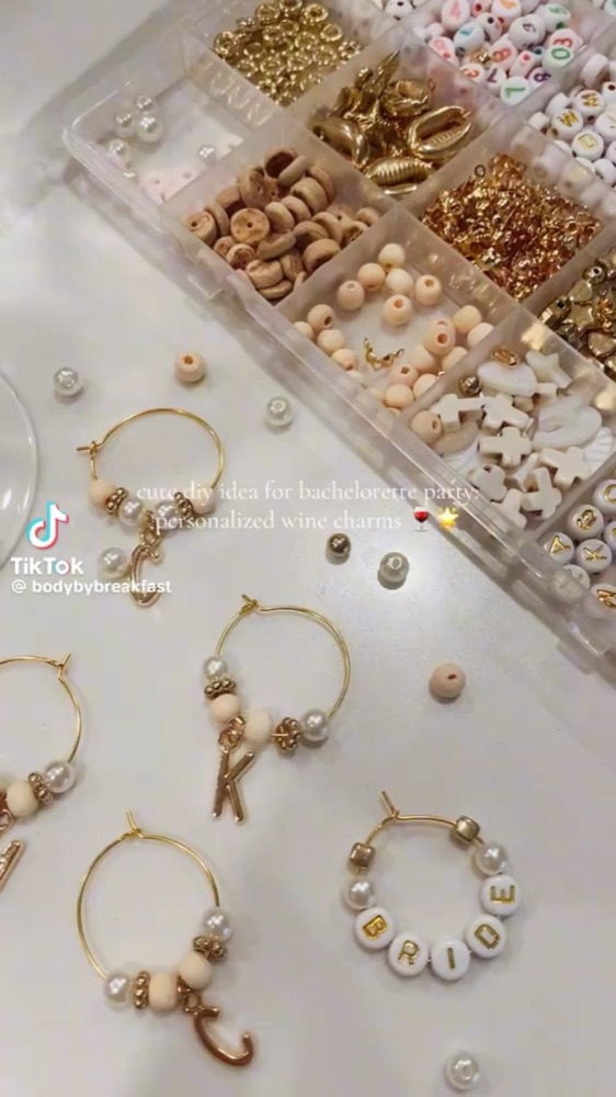 Beaded wine charms spelling BRIDE